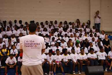 Tobias Harris addresses a group of student promoting the Don't Text And Drive promotion