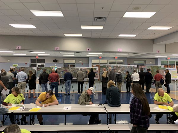 Citizens examine Osceola Parkway Extension maps at Public Meeting